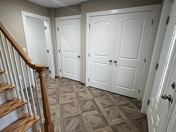 Private foyer with entrance from private garage and two large closets