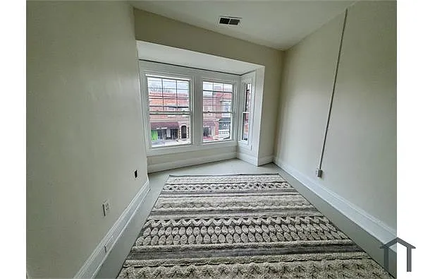 Building Photo - 9714 Lorain Ave #1