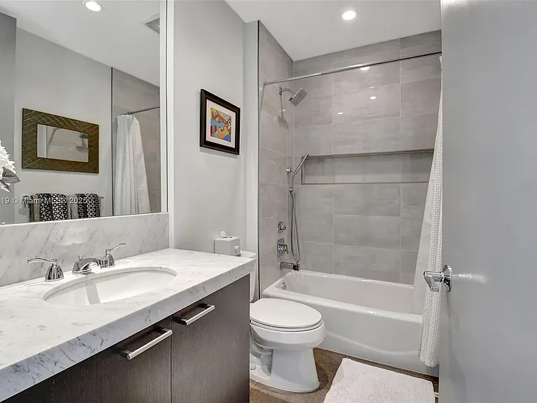 110 SE 2nd St #203 — Photo 26