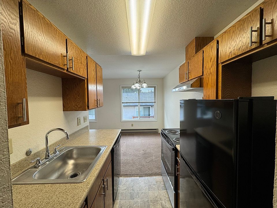 Kitchen with fridge, stove & dishwasher