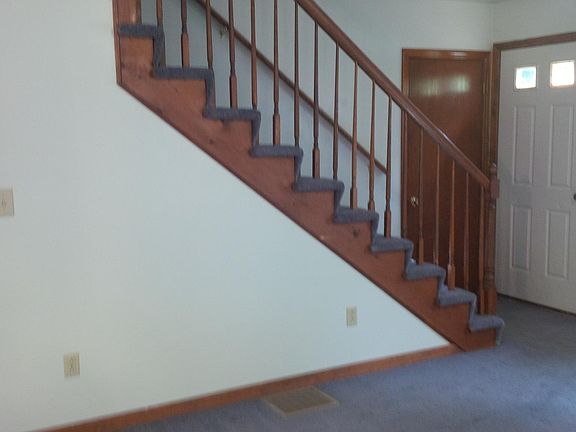 Living room w stairs leading to upstairs 2nd floor