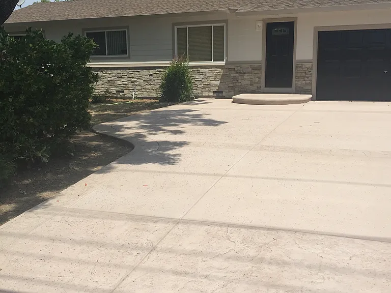 Parking in front of main house (1 tandem space) on right side of driveway