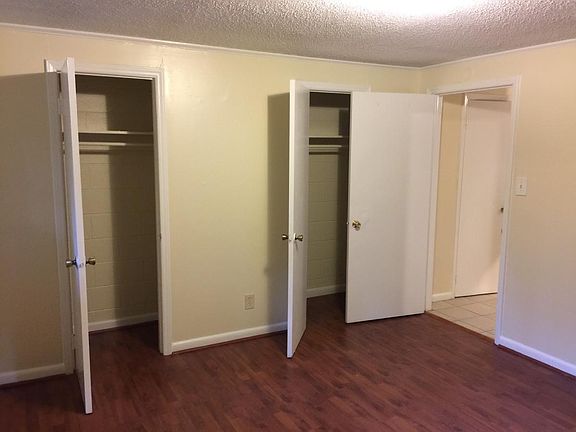 His & her closet in bedroom