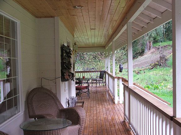 Wrap-around porch for rainy day entertainment