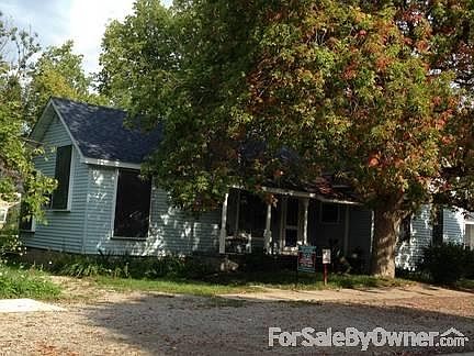 Blue House
						:
						Large lot with garage on alley behind house