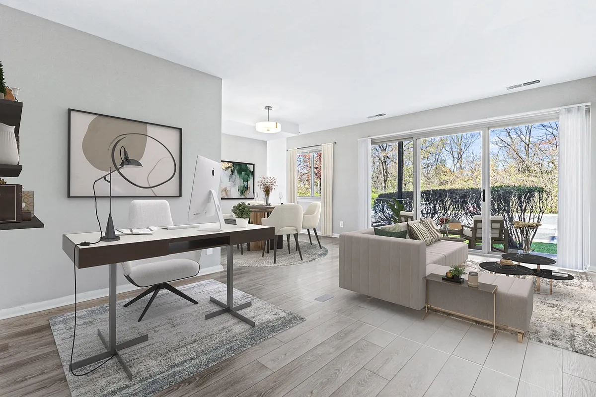 Spacious Living Area with Lots of Natural Light - Congressional Towers