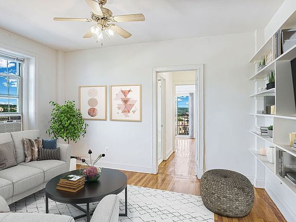 Spacious Living Room with Built-In Cabinetry at The Melwood