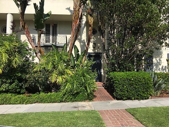 Outside Entry way with garden. Unit D is slightly off to the