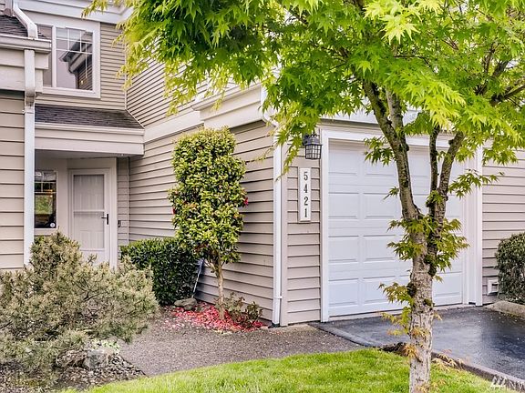 Welcoming entry, along with the convenience of a private garage.