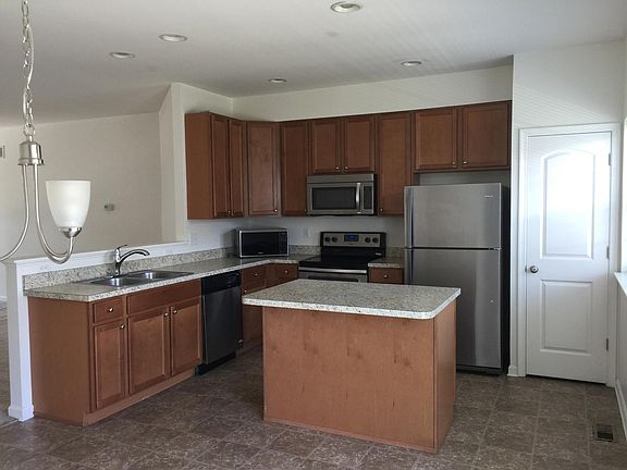 Furnished kitchen with stainless steel appliances