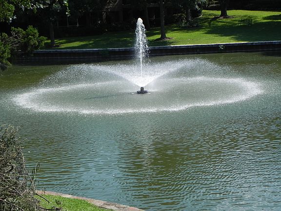 Fountain behind the home