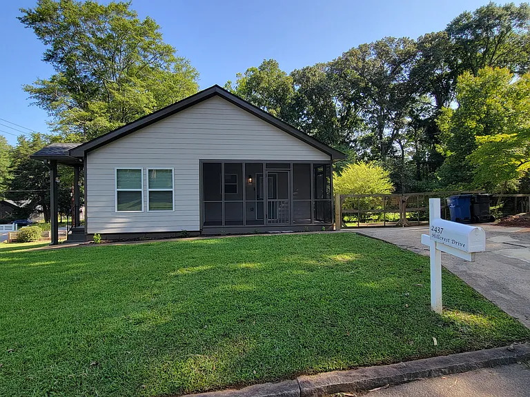 Off-street parking and screened-in porch.