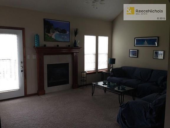 Vaulted Ceilings and Fireplace in large living room
