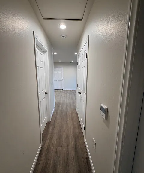 HALLWAY looking towards LIVING ROOM/KITCHEN area