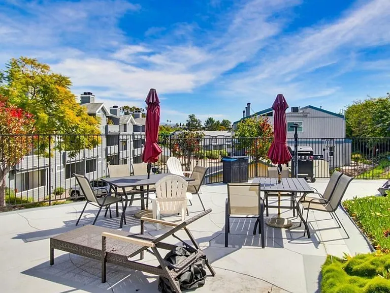 tables, chairs, umbrellas & BBQ by the pool