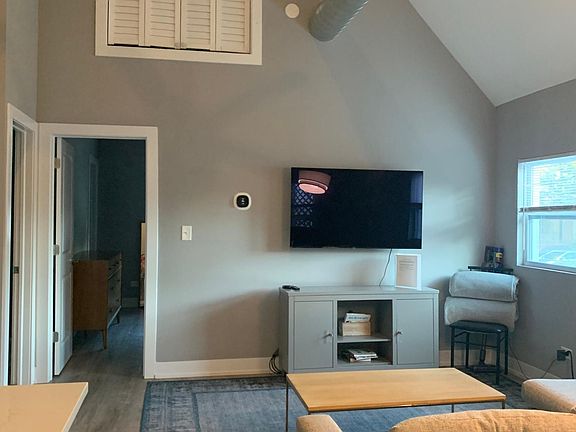 High lofted ceiling, bright living space