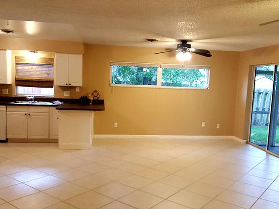 Dining Room with Adjacent Kitchen