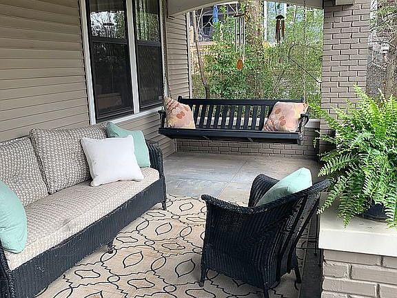 Porch swing conveys