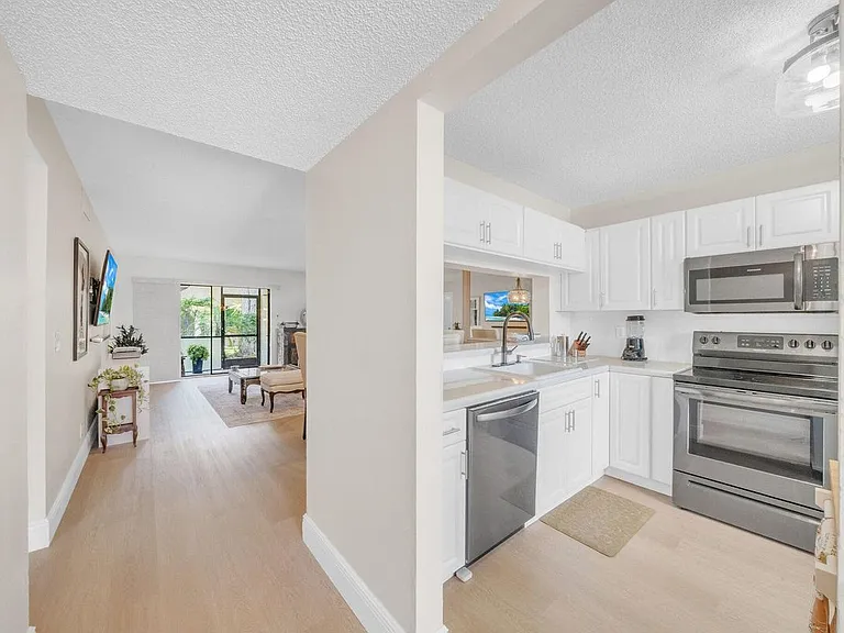 22136 Palms Way #103 — Photo 1