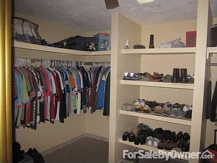 Master's walking closet.
						:
						Mirror doors. Plenty of space and shelves.