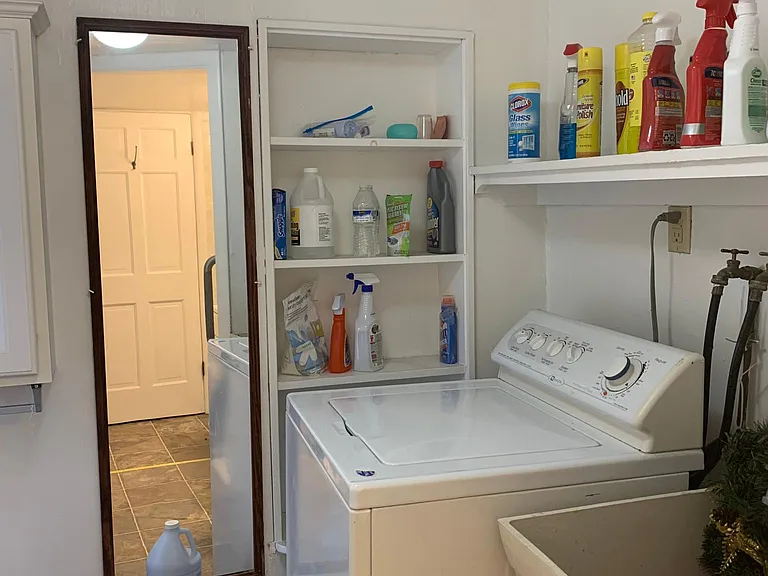 Laundry room, located off of the bathroom