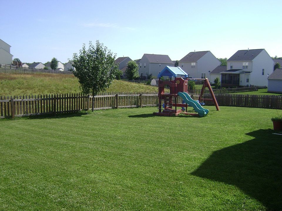 One of the only flat backyards in the neighborhood!  Large common area also!
