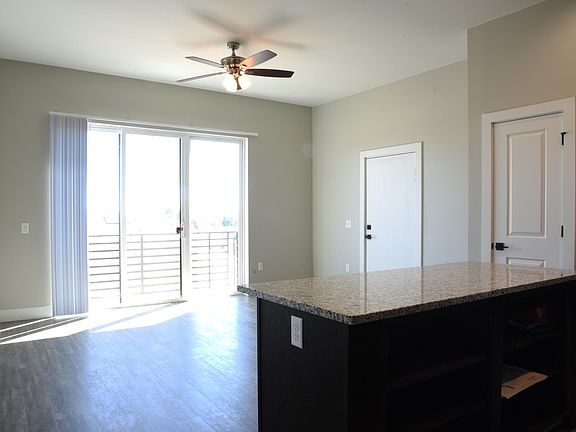 LOTS OF SUNLIGHT. COMFORT WITH CEILING FANS AND CENTRAL AIR CONDITIONING
