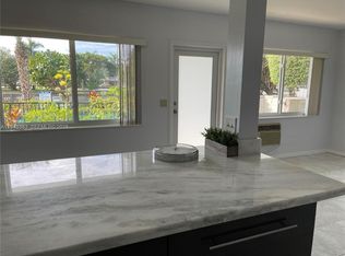 455 Golden Isles Dr APT 107, Hallandale, FL 33009