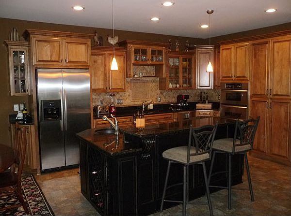 Custom designed kitchen cabinets, granite and stainless