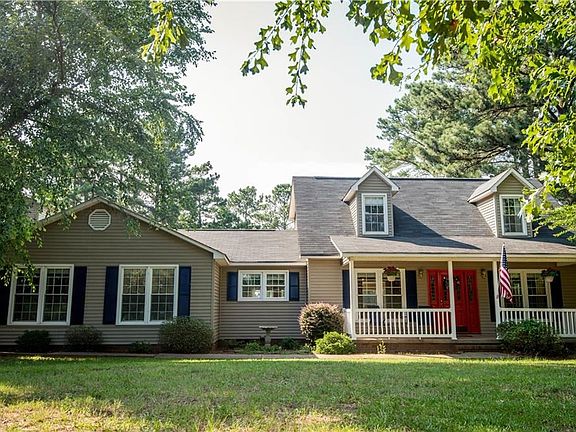 Beautiful Country home on wooded 2.02 acres with circular driveway