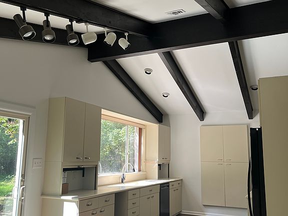 Kitchen with sliding door to back patio.