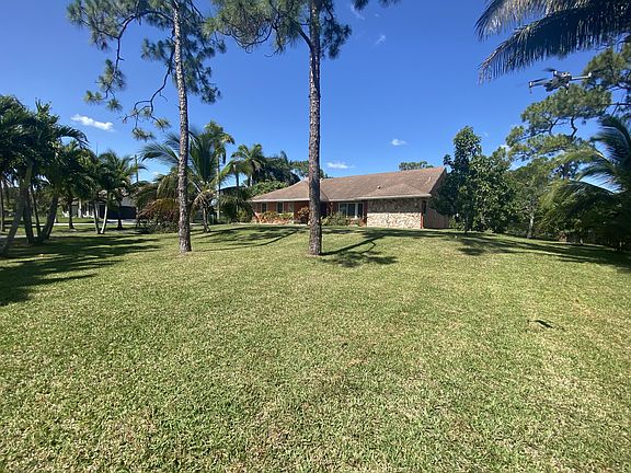 4th image of 6877 Royal Palm Beach Blvd