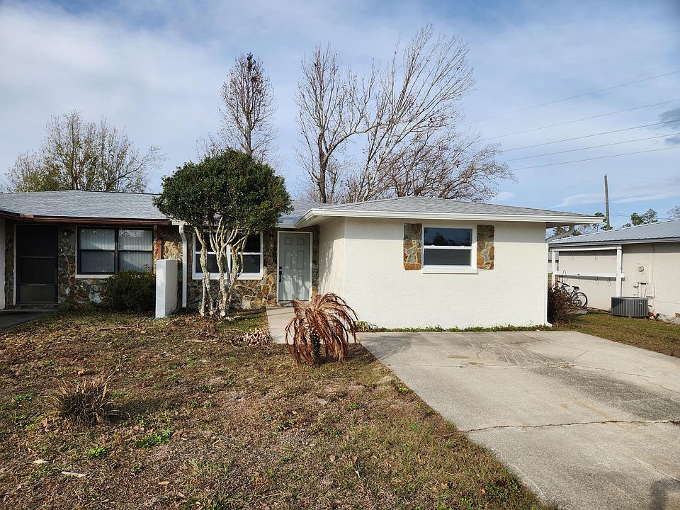 Front Exterior. Driveway.