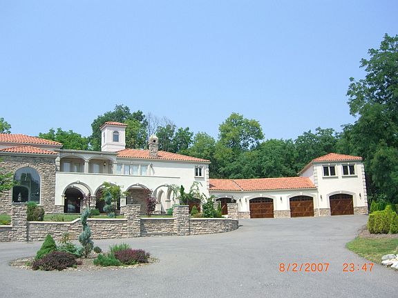 6-Car over-sized garage with Nanny's Quarters of Guest Suite upstairs