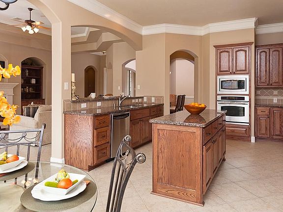 One of the newest, largest one story homes in Greatwood located in highly  sought after Lakeside Village!  Large island kitchen with granite counters, tile floors & GE Profile stainless steel appliances.