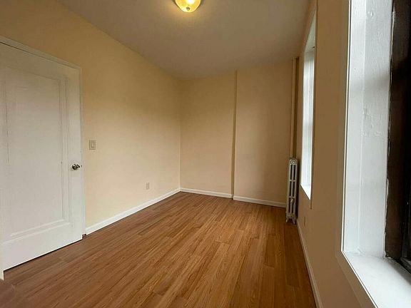 5th image of 61-23 Woodbine St #1C