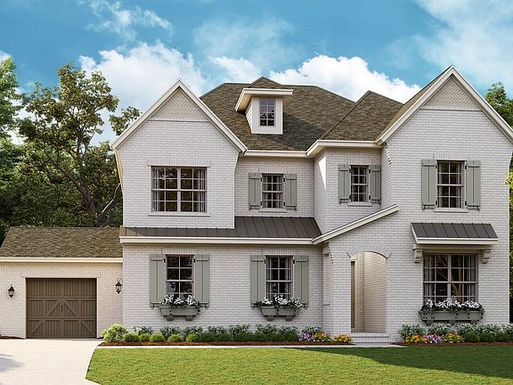 Coronado - English Cottage b with optional painted brick 3-Car Side Load Garage Note Renderin