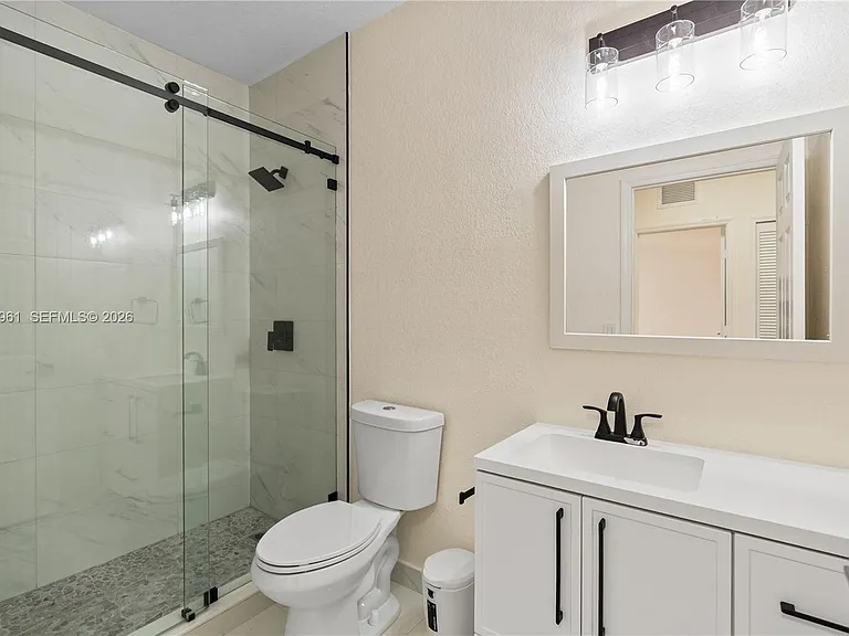 11476 NW 77th Ln — Photo 32
