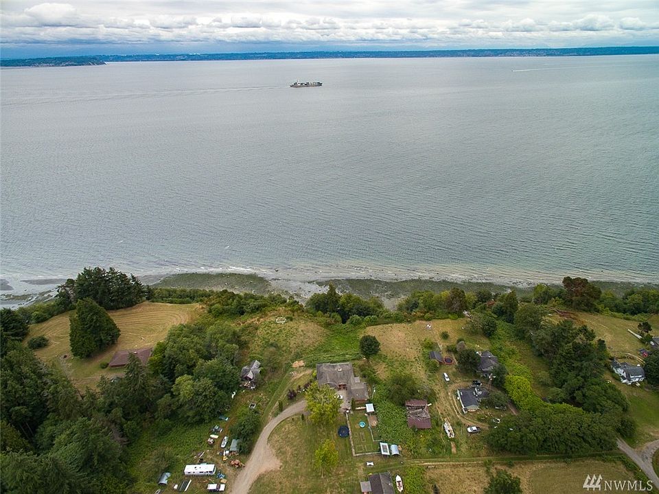 At the center, where the collapsed barn sits is the waterfront home site that is for sale. 
