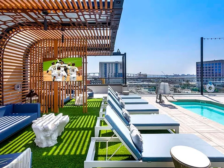 We're all about that view! Lounge the day away on stylish lounge seating on the rooftop pool deck