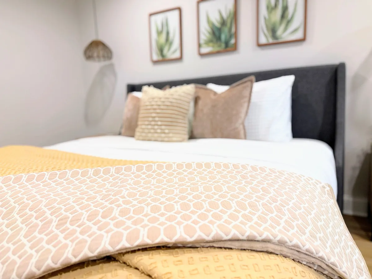 Snuggle into your cozy bed with black out curtains and get some much needed zzzzs. - 7621 Central College Rd