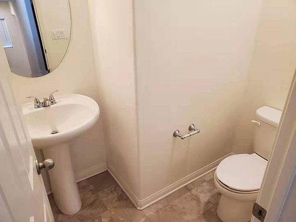 Half bath next to the living room.