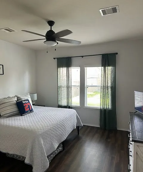 Primary bedroom located on floor level.