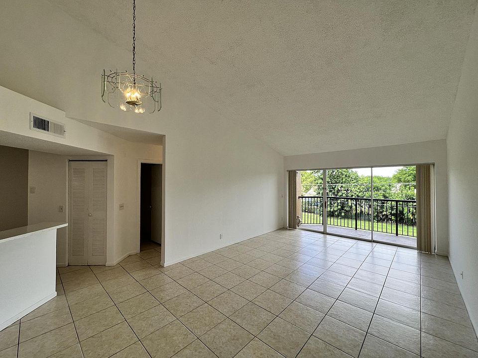1st image of 9033 Wiles Rd APT 303