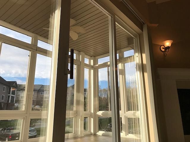 Beautiful, sunny 4 season room off living room