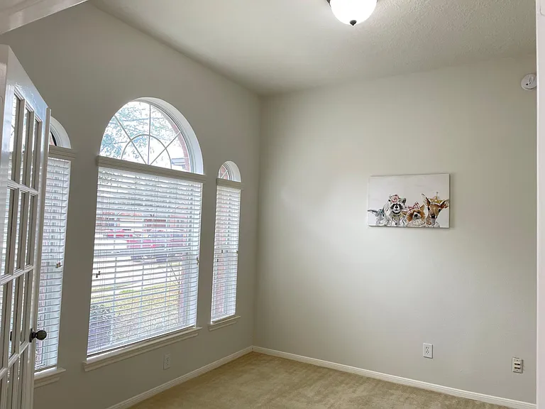 Private study, ideal for a home office or optional fourth bedroom.