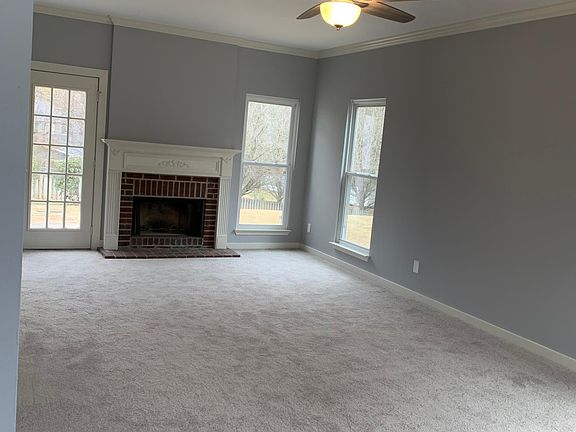 Living Room with wood burning Fire Place
