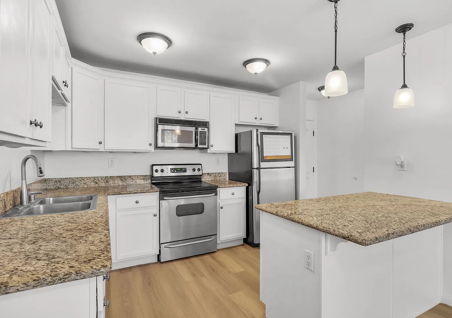 Updated 1-Bedroom Condo with in-Unit Washer/Dryer! Water Included! — Photo 2