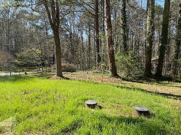 Fenced in back yard on 1/2 acre corner lot. Quiet family neighborhood.