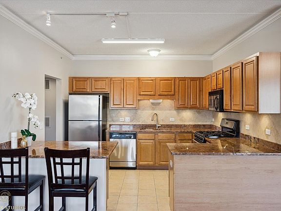 4th image of 9670 Franklin Ave Unit 313